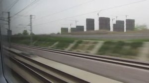 Поезд ВСМ рейса G1 в пути: скорость 300 км/ч