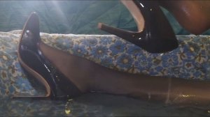 WETLOOK taking a bath fully clothed in a business suit, tights and heels.