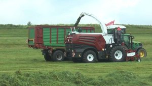 Rostselmash RSM F 2650 working hard on grassland demo in Germany