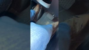 Pedal Pumping A Cranking her car in Jeans and Cowgirl Boots