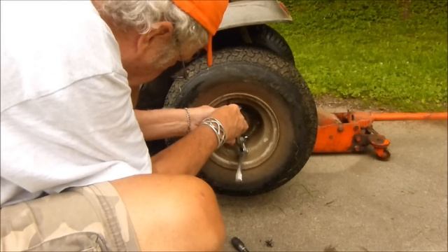 How To Remove Wheel from MTD Riding Mower смотреть онлайн