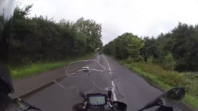 Met Ben Brown and we rode bikes. slowly. in the rain. to a car park.