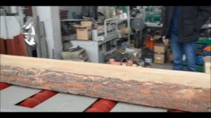 Распиловка лафета на доски на двухвальном многопильном станке с применением механизации