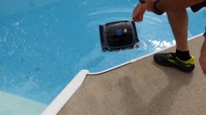 WYBOT C1 robot pool Vac cleaning an in-ground pool
