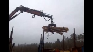 Погрузка леса гидроманипулятором