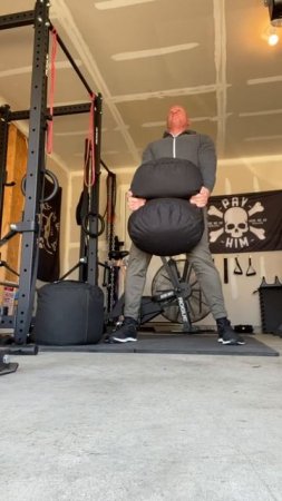 210 lbs sandbag “picks” off the ground.