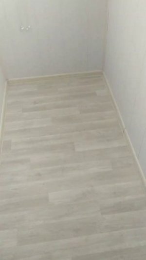 Отделка балкона МДФ панелями.
