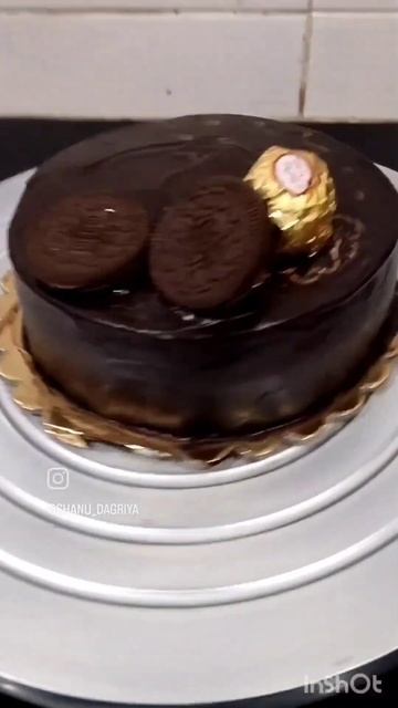Holics ..  chocolate truffle 1.5 pound cake .. decore with Ferrero rocher and Oreo...