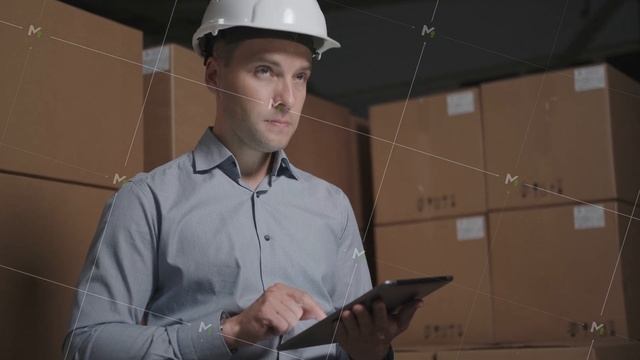 Man at a large storage, looks around, finds a box and takes notes. смотреть онлайн