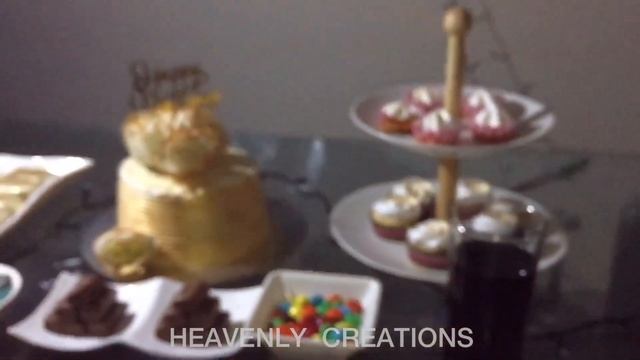 Birthday table arrangements ideasWhite truffle cake with golden dustcakesiclescupcakeschocolate