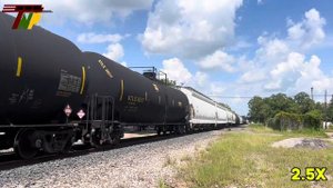 Union Pacific manifest rolls by the Bay City Mo-PAC depot!