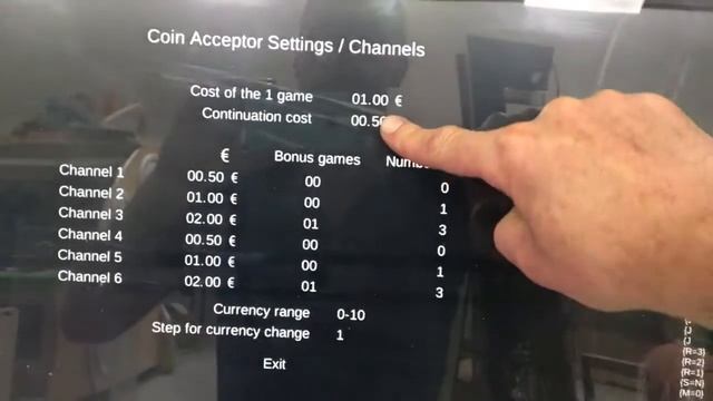 Dino kiddy checking and changing coin selector settings