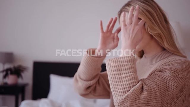 Blonde woman works at home with laptop, removes hair not to interfere смотреть онлайн