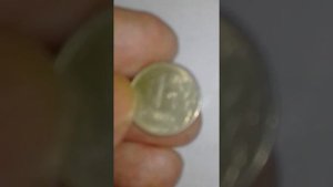 (БРАК)1 рубль 2005 года СПМД.НЕМАГНИТНАЯ.РОССИЯ.Раскол реверса от канта до канта.