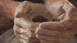 Work in the pottery workshop: clay ware on the potter's wheel