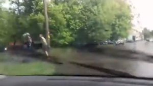 Купание в луже в ливень 30.06.17.Москва
