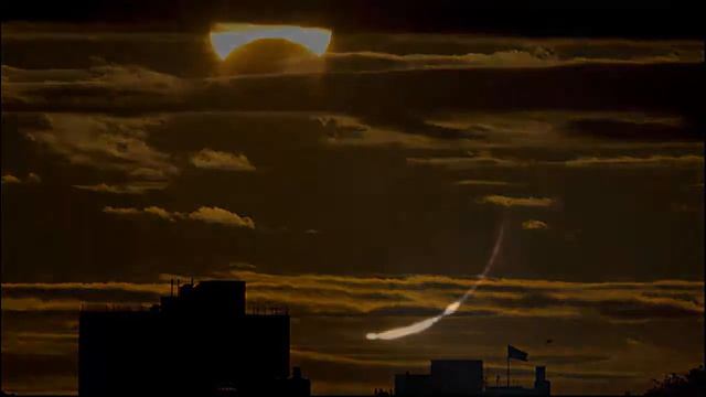 Rare Hybrid Solar Eclipse Photos  - Sun dog Phantom Sun