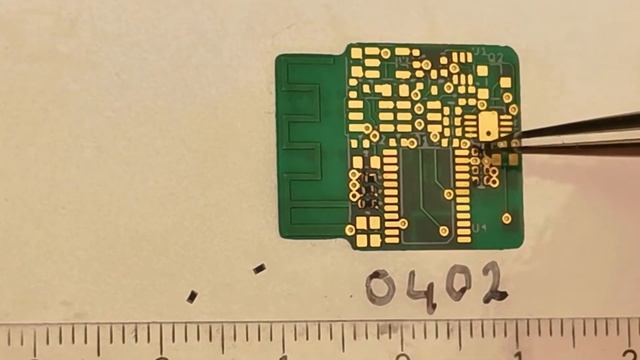 Placing SMD 0402 parts after using the Spoty solder paste dispenser смотреть онлайн