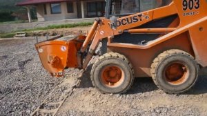 Concrete mixer Kovaco ML 300 on a Locust L 903 skid steer loader