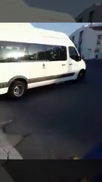 Страна Болгария город Созополь микроавтобус с прицепом выезжает на улицу Республиканска