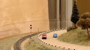 М62 с товарным поездом на макете