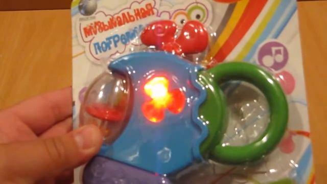 Детская игрушка видеообзор - погремушка