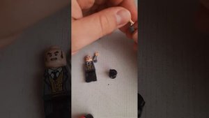 Аргус Филч дед с кошкой из  Гарри Поттер обзор минифигурки Shorts
