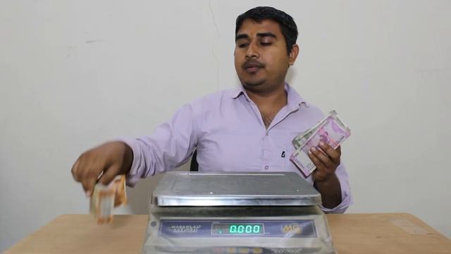 200 500 2000 के नोटों के बडंल का वजन | Weight difference of bundle of 200 500 2000 notes смотреть онлайн
