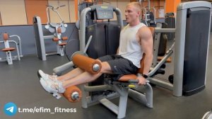 Сгибания ног в тренажёре сидя - техника выполнения