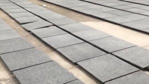 China Black Granite Flamed+Waterjet Surface For Spain Floor Project From Tingida Stone