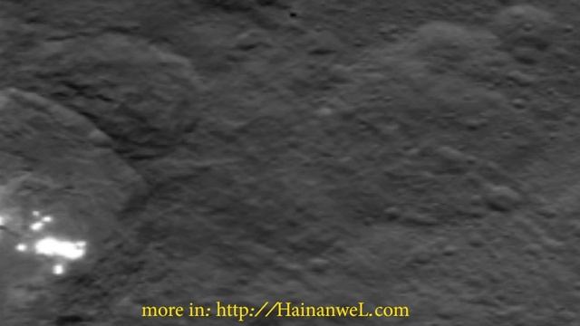 Dawn made new pictures of unusual white spots on the asteroid Ceres смотреть онлайн