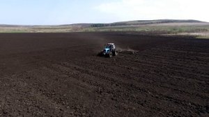 Боронование земли