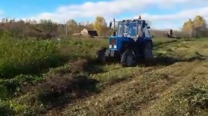 Покос травы трактором