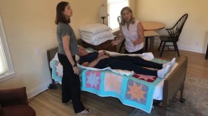 Moving a Patient Up in Bed with a Two-Person Assist