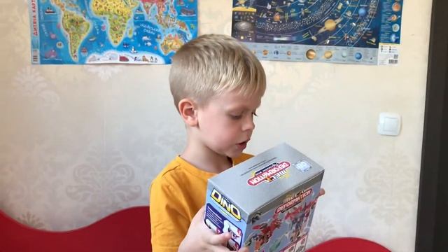 Распаковка робота трансформера Deformation Dino Toy