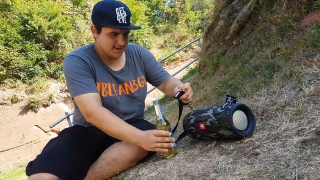 Jblfan361 opens bottle with the JBL Xtreme 2 shoulder strap
