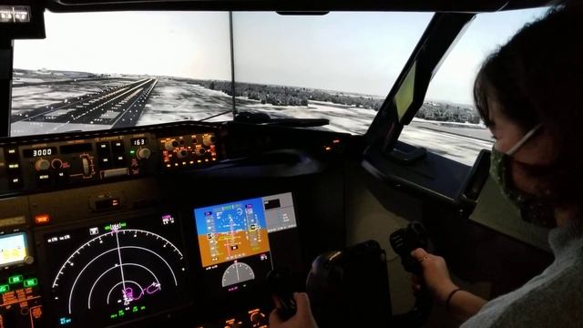 Flying the 737-MAX Simulator (Her first time flying any type of plane)