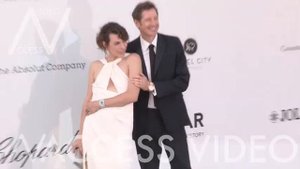 Milla Jovovich, Paul W. S. Anderson at amfAR Cannes 2019