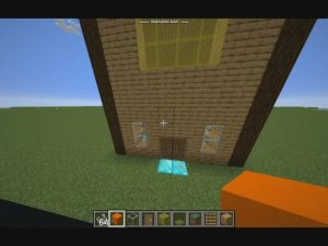Minecraft. Дом с жёлтыми окнами.