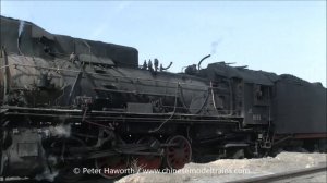 Chinese Railways - JS Class Steam Locomotives Work Coal Trains Out of The Coal Pit at Sandaoling