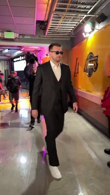 Luka suited up as he walks into his new home arena!
