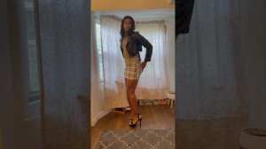 Crossdresser in mini skirt and heels