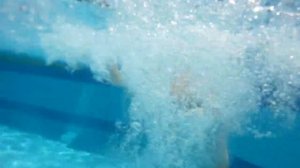 Скинули в бассейн.pushed into the pool