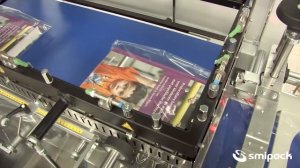 Упаковка книг в термоусадочную пленку на автоматической машине Smipack FP6000