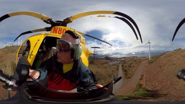 Utility Line Inspection with ICI Camera from Helicopter flying through wind farm.