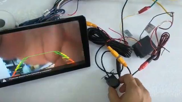 If installing an aftermarket reversing camera is interfering you need a filter