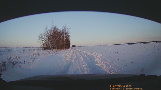Покатушки по полям в одиночку на гранте по снежной колее от Нивы.
