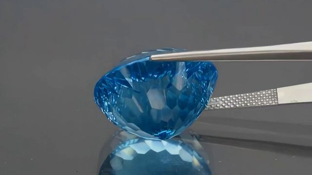 Натуральный голубой свисс Топаз овал 18.8x16.8мм 31.19ct смотреть онлайн