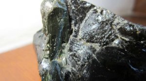 Tektite green whit metallic inclusion ~70 grams