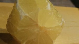 Slicing a Seedless Lisbon Lemon